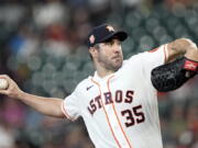 Houston Astros starting pitcher Justin Verlander throws against the Seattle Mariners during the first inning of a baseball game Tuesday, June 7, 2022, in Houston. (AP Photo/David J.