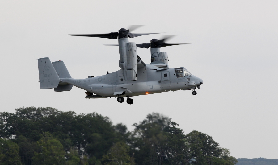 FILE - A MV-22B Osprey tiltrotor aircraft flies at Marine Corps Air Facility at Marine Corps Base in Quantico, Va., on on Aug. 3, 2012. Officials say a Marine Corps MV-22B Osprey carrying five Marines crashed in the Southern California desert, Wednesday afternoon, June 8, 2022, during training in a remote area near the community of Glamis in Imperial County. Military officials have yet to release official word on the fate of the five Marines. (AP Photo/Haraz N.
