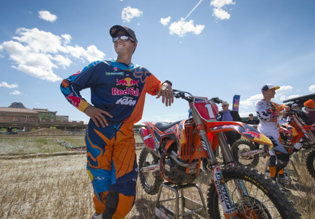Ryan Dungey talks to reporters May 16, 2013, after demonstration rides on a temporary track set up at the downtown rail yards in Sacramento, Calif. Three-time motocross champion Dungey, who returned this season after a five-year retirement, has 800,000 Instagram followers and 213,000 more on Twitter.