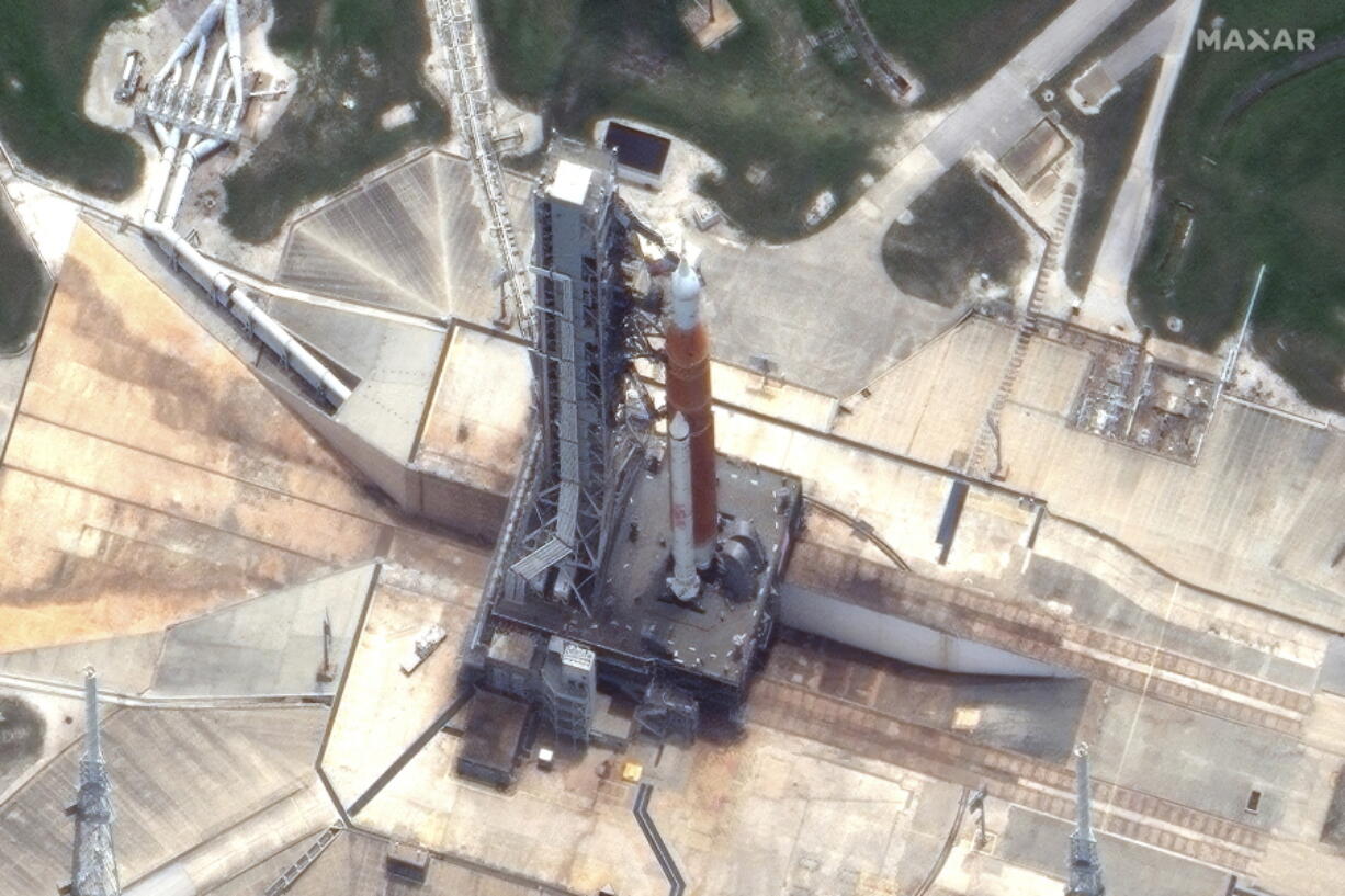 This satellite image provided by Maxar Technologies shows NASA's Space Launch System (SLS) rocket and and the Orion space capsule on the launch pad at Launch Complex 39B at the Kennedy Space Center in Florida on Saturday, June 18, 2022.