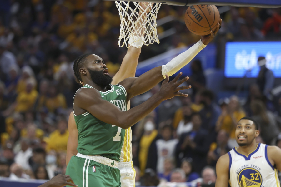 Boston Celtics guard Jaylen Brown (7) shoots against the Golden State Warriors during the second half of Game 1 of basketball's NBA Finals in San Francisco, Thursday, June 2, 2022.