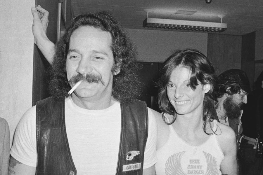 FILE - Hells Angels founder Ralph "Sonny" Barger and his wife Sharon are shown after his release on $100,000 bond in San Francisco, Aug. 1, 1980. Barger, the leather-clad figurehead of the notorious Hells Angels motorcycle club, has died at age 83. Barger's death was announced late Wednesday, June 29, 2022, on his Facebook page. Barger composed the post placed on the Facebook page managed by his current wife, Zorana.