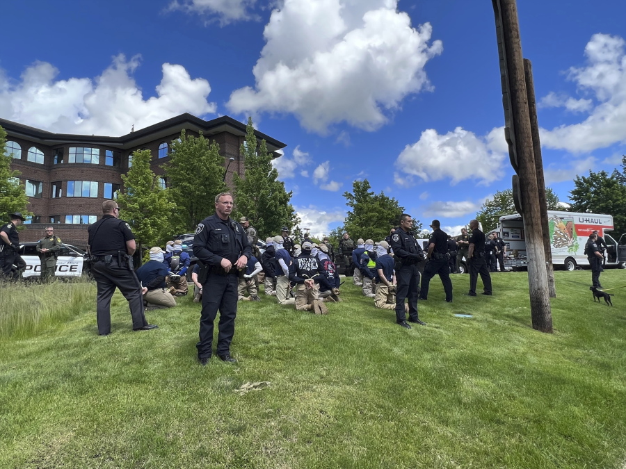 Authorities arrest members of the white supremacist group Patriot Front near an Idaho pride event Saturday, June 11, 2022, after they were found packed into the back of a U-Haul truck with riot gear.