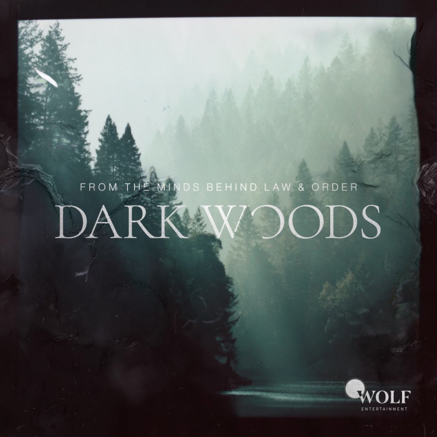 This image released by Wolf Entertainment shows art for the fiction podcast "Dark Woods," with Corey Stoll and Monica Raymund.