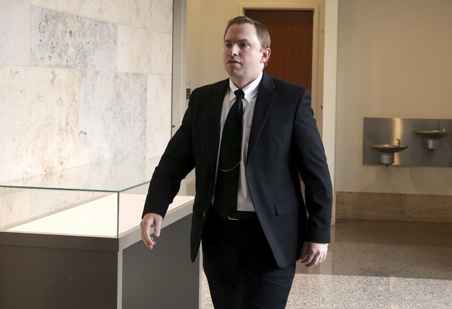 FILE - Aaron Dean, who is charged in the murder of Atatiana Jefferson, walks into the courtroom following a break in the third day of a pretrial hearing Wednesday, May 4, 2022, in Fort Worth, Texas. A new judge must be assigned to oversee the murder case against Dean, a former Texas police officer after defense attorneys successfully argued that the initial judge must recuse himself. Retired Second Court of Appeals Justice Lee Gabriel issued the decision Tuesday, June 28, after hearing arguments last week.