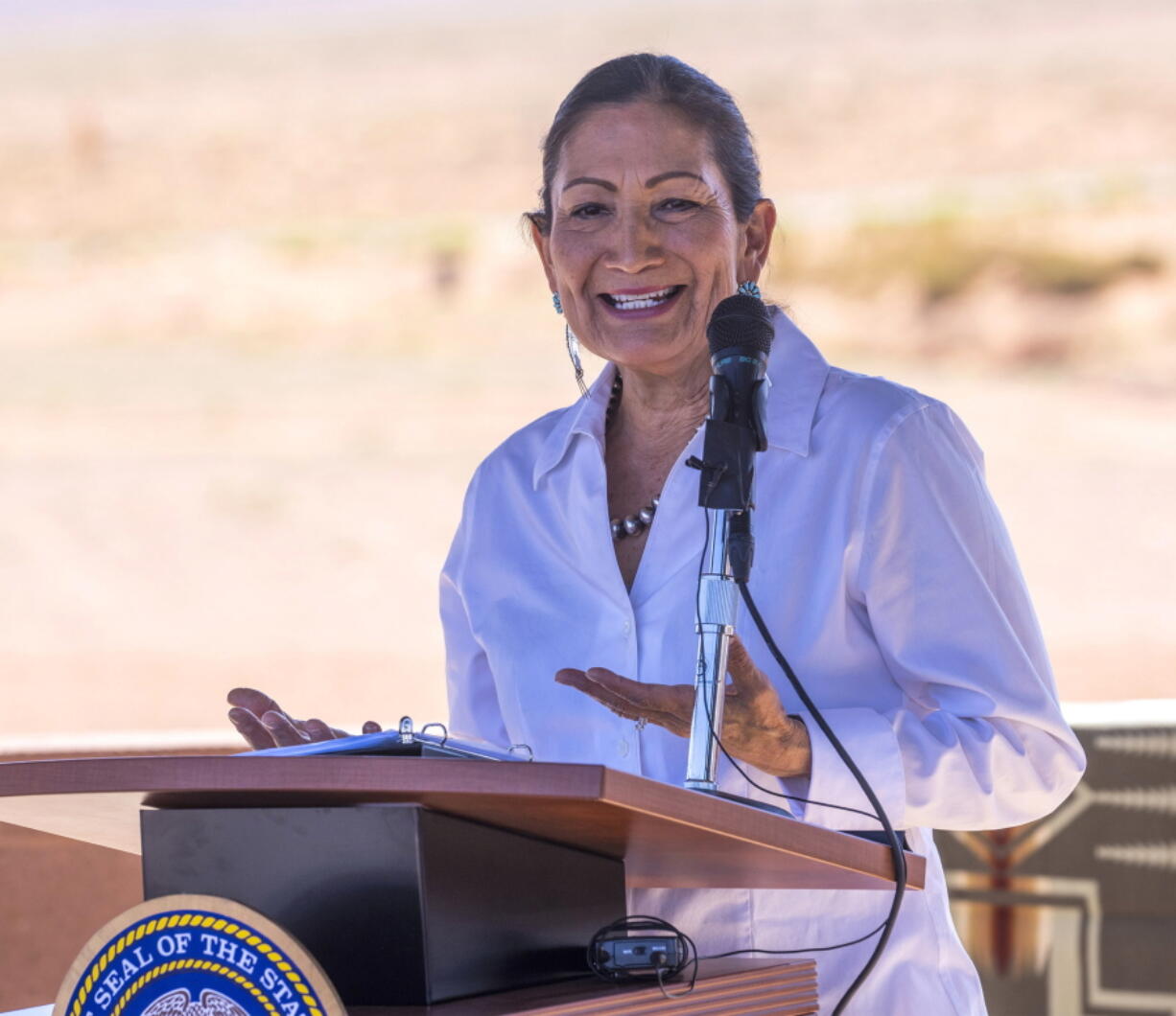 FILE - U.S. Secretary of the Interior Deb Haaland speaks after signing the agreement for the Navajo federal reserved water rights settlement at Monument Valley, Utah on Friday, May 27, 2022. Interior Secretary Deb Haaland on Thursday, June 16, 2022 announced $9 million for 40 projects in Idaho and seven other Western states for sagebrush ecosystems to combat invasive species and wildfire, reduce the spread of juniper trees and promote community and economic stability.