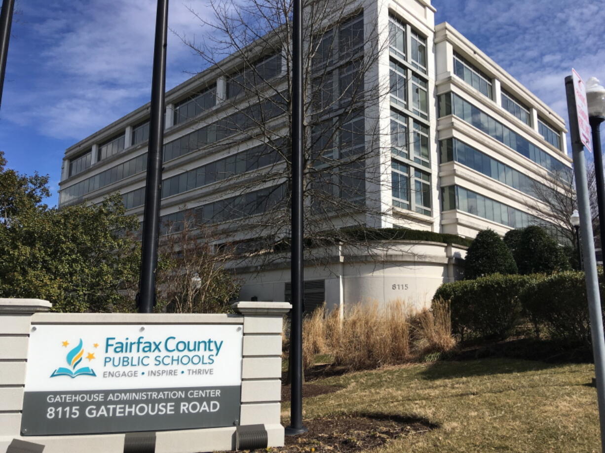 FILE - The Fairfax County Public Schools building stands in Merrifield, Va., on March 4, 2019. A pair of lawsuits that for years have plagued Virginia's largest school system with allegations that it ignored students' accusations of sex assaults are back in front of federal judges in June 2022. One of the lawsuits includes allegations of horrific abuse suffered by a student at a Fairfax County middle school and was the basis for a 2014 federal investigation.