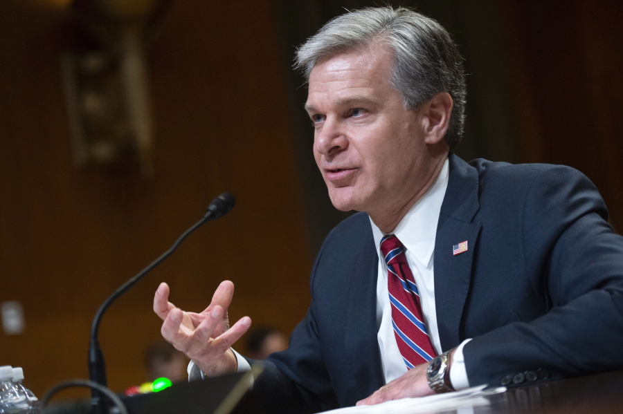 Director of the Federal Bureau of Investigation Christopher Wray testifies during a Senate Appropriations Subcommittee hearing on the fiscal year 2023 budget for the FBI in Washington, DC on Wednesday, May 25, 2022.