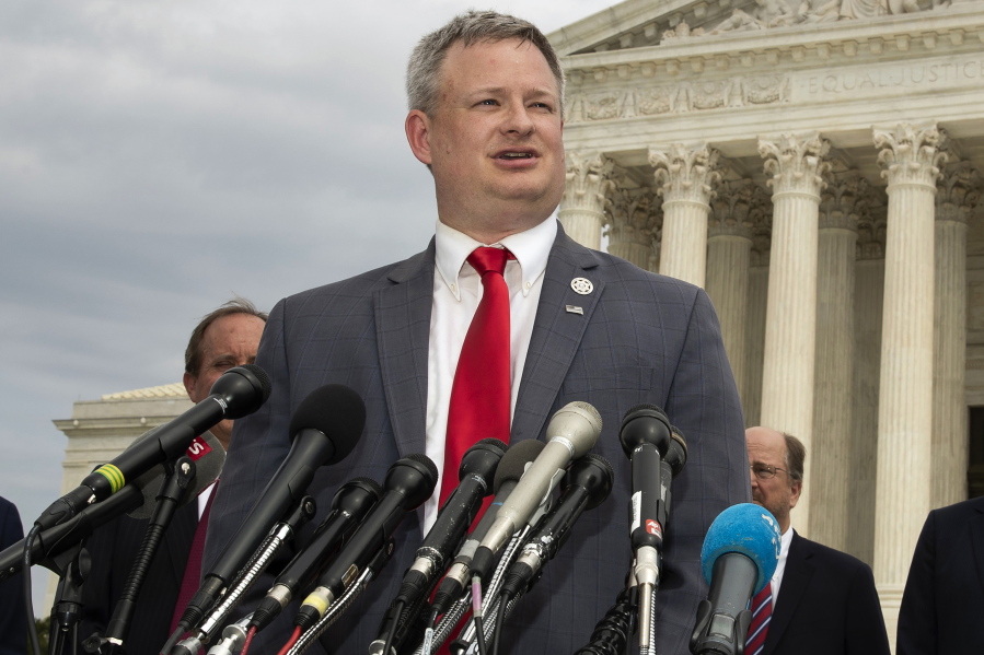 FILE - In this Sept. 9, 2019 file photo, South Dakota Attorney General Jason Ravnsborg, speaks to reporters in front of the U.S. Supreme Court in Washington. Ravnsborg faces the state's first impeachment trial next week for his conduct surrounding a 2020 car crash in which he struck and killed a pedestrian.