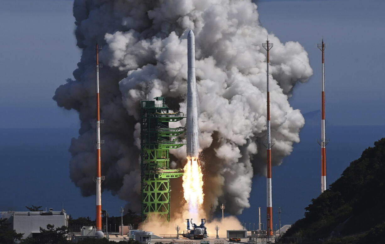 The Nuri rocket, the first domestically produced space rocket, lifts off from a launch pad at the Naro Space Center in Goheung, South Korea, Tuesday, June 21, 2022. South Korea launched its first domestically built space rocket on Tuesday in the country's second attempt, months after its earlier liftoff failed to place a payload into orbit.