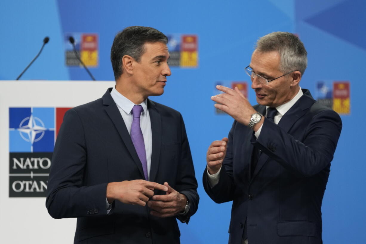 NATO Secretary General Jens Stoltenberg, right, talks with Spanish Prime Minister Pedro Sanchez at the NATO summit venue in Madrid, Spain on Tuesday, June 28, 2022. North Atlantic Treaty Organization heads of state will meet for a NATO summit in Madrid from Tuesday through Thursday.
