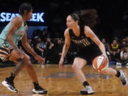 Seattle Storm guard Sue Bird (10) drives against New York Liberty guard CrystalDangerfield during the first half of WNBA basketball game Sunday, June 19, 2022 at Madison Square Garden in New York.