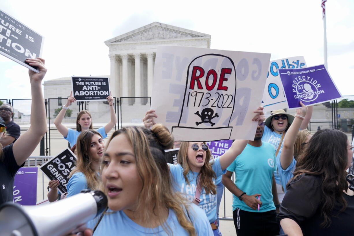 Demonstrators protest about abortion outside the Supreme Court in Washington, Friday, June 24, 2022.