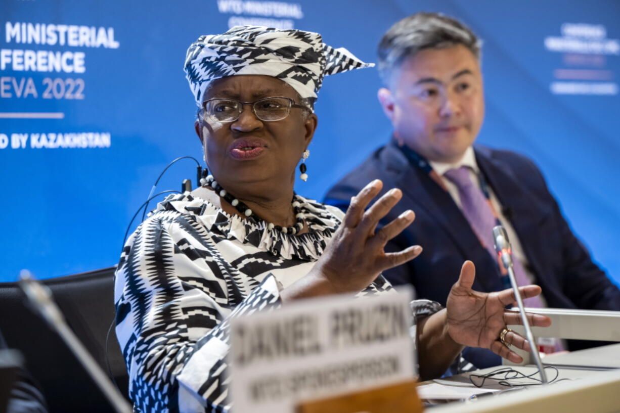 Director-General of the World Trade Organisation (WTO) Ngozi Okonjo-Iweala, left, and Timur Suleimenov, Chair of the 12th Ministerial Conference attend a press conference before the opening of the 12th Ministerial Conference at the headquarters of the World Trade Organization (WTO), in Geneva, Switzerland, Sunday, June 12, 2022. For the first time in 4 1/2 years, after a pandemic pause, government ministers from WTO countries will gather for four days starting Sunday to tackle issues like overfishing of the seas, COVID-19 vaccines for the developing world and food security.