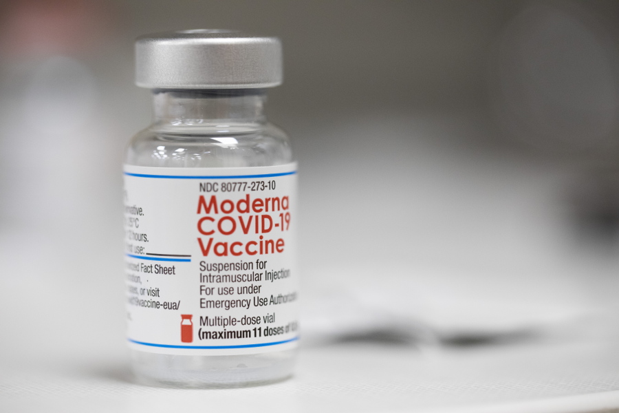 FILE - A vial of the Moderna COVID-19 vaccine is displayed on a counter at a pharmacy in Portland, Ore. on Dec. 27, 2021. U.S. health authorities are facing a critical decision: whether to offer COVID-19 booster shots this fall that better match the omicron variant even though the coronavirus already has spawned still more mutants. Moderna and Pfizer are testing updated booster candidates, and advisers to the U.S. Food and Drug Administration will debate Tuesday, June 28, 2022, if it's time for a switch, setting the stage for similar moves by other countries.