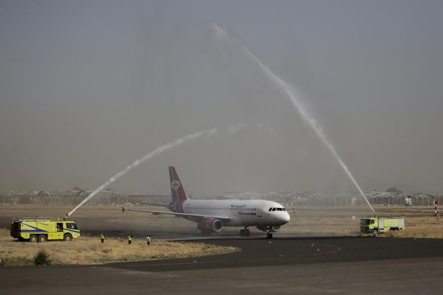 FILE - A Yemen Airways plane, the first commercial flight in six years from Yemen's rebel-held capital is greeted with a water spray salute at the Sanaa international airport, part of a fragile truce in the county's grinding civil war, in Sanaa, Yemen, May, 16, 2022. U.N. Special Envoy for Yemen Hans Grundberg said in a statement June 2, 2022, that Yemen's warring parties have agreed to renew the nationwide truce for another two months, a rare spot of good news for a country plagued by eight years of war.