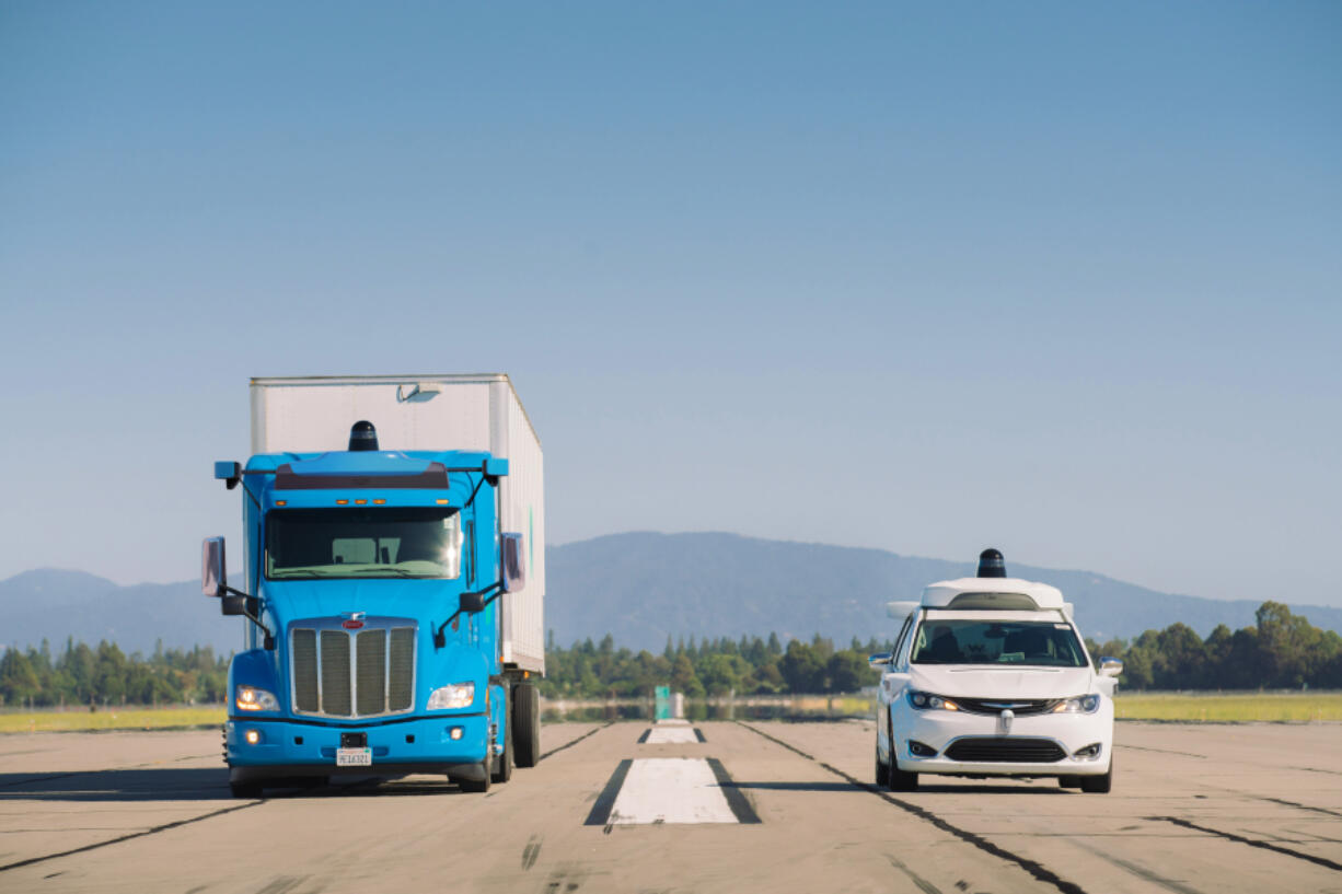 Waymo self-driving truck and Pacifica van. Self-driving big rigs will be soon hauling Wayfair furniture down Interstate 45 through a new partnership of Waymo and J.B. Hunt Transport Services.