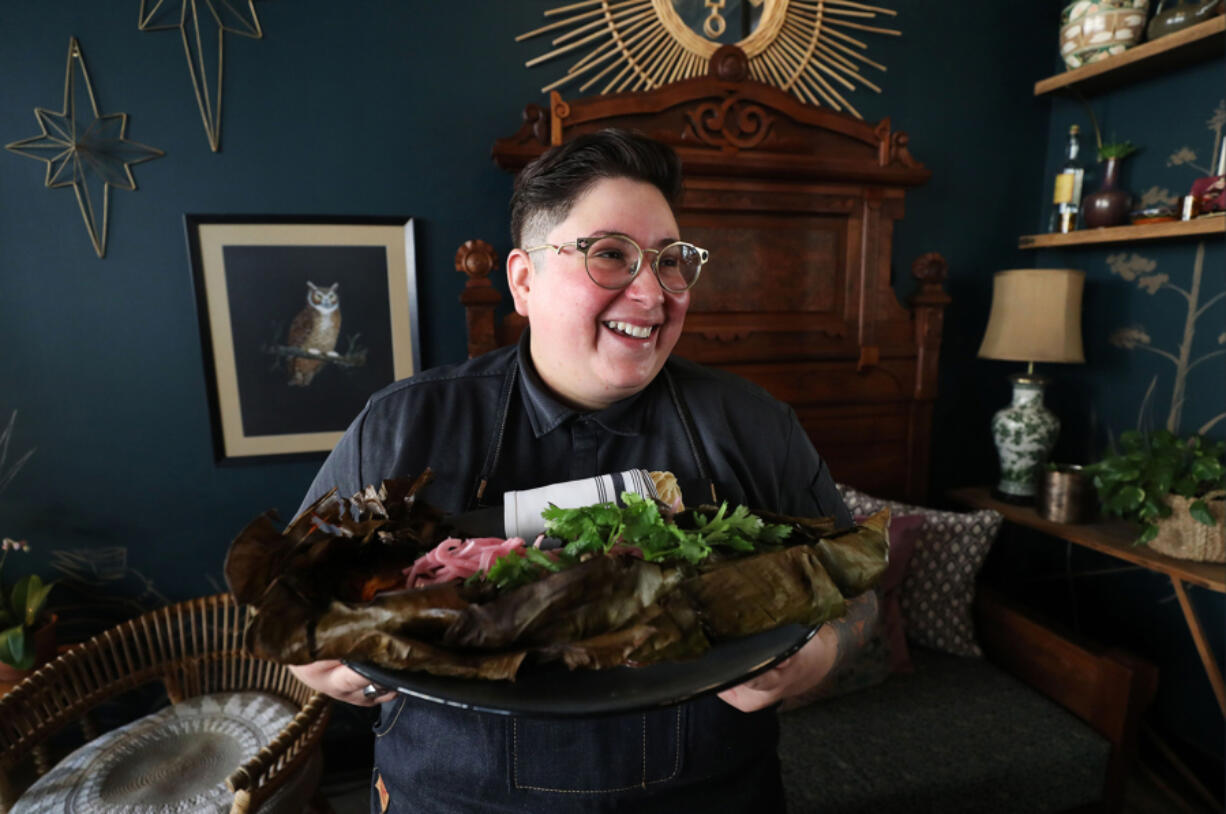 Chef/Partner Wendy Lopez shows Mediterranean seabass pibil at Reyes Mezcaleria in Orlando, Fla.