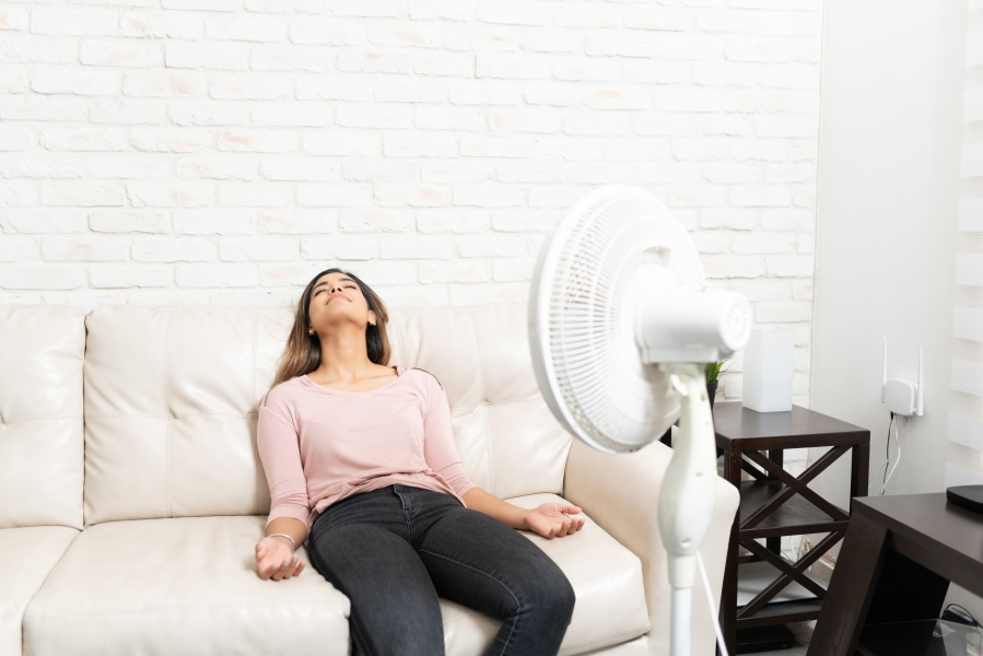 Fan energy is minimal, so you're not generating a lot of heat from using them -- especially relative to how much comfort you gain in return.