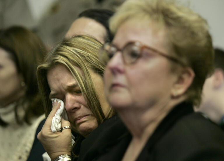 Stephanie Johnson, mother of Chelsea Harrison, cries with relief after hearing the jury verdict on Jan. 24, 2005:  Roy Russell guilty of killing her 14 year-old daughter.  Sylvia Johnson at right was Chelsea's grandmother.