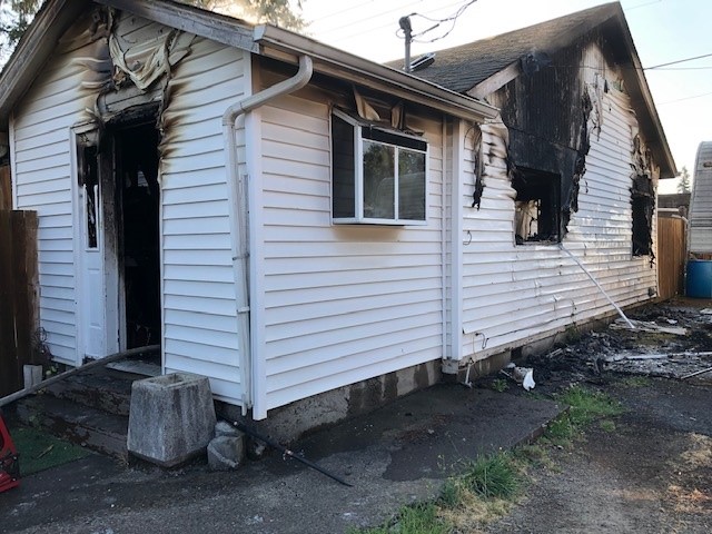 A house that caught fire Thursday morning in the Barberton area. Two construction workers who spotted the fire on their way to work Thursday morning helped pull an 11-year-old girl from the burning house.