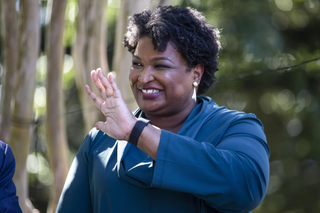 Georgia gubernatorial candidate Stacey Abrams is introduced before speaking at a rally on Oct. 17, 2021, in Norfolk, Virginia.