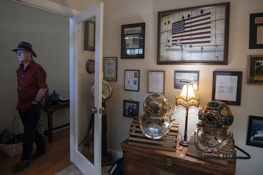 Bradley "Mitch" Mitchell of Vancouver keeps part of his collection of antique diving equipment in a home office and part in his garage. Mitchell will display the items at the Clark County Fair.