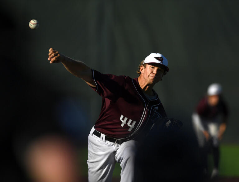 Raptors pitcher Ryan Harvey warms up between innings Tuesday, July 12, 2022, during a game between the Ridgefield Raptors and the Bellingham Bells at the Ridgefield Outdoor Recreation Complex.