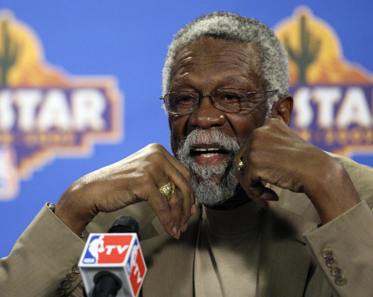 FILE - Former NBA great Bill Russell speaks during a news conference at the NBA All-Star basketball weekend, Feb. 14, 2009, in Phoenix. The NBA great Bill Russell has died at age 88. His family said on social media that Russell died on Sunday, July 31, 2022. Russell anchored a Boston Celtics dynasty that won 11 titles in 13 years.