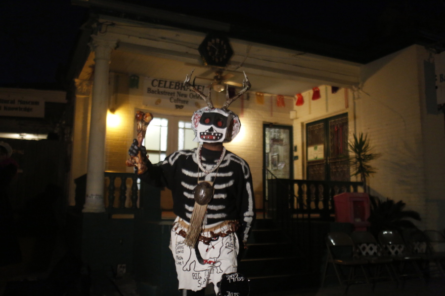 A member of the North Side Skull & Bone Gang starts the celebration with a wake-up call for Mardi Gras at the Backstreet Cultural Museum, Feb. 9, 2016, in New Orleans.