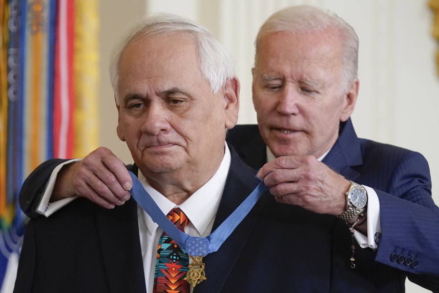 President Joe Biden awards the Medal of Honor to Spc. Dwight Birdwell for his actions on Jan. 31, 1968, during the Vietnam War, during a ceremony in the East Room of the White House, Tuesday, July 5, 2022, in Washington.