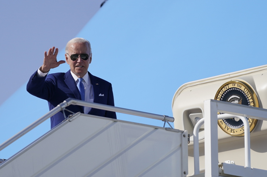 President Joe Biden waves before departure, July 16, 2022, in Jeddah, Saudi Arabia.