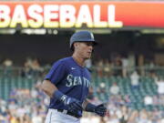 Seattle Mariners' Dylan Moore rounds the bases after hitting a solo home run against the Toronto Blue Jays during the second inning of a baseball game, Thursday, July 7, 2022, in Seattle. (AP Photo/Ted S.