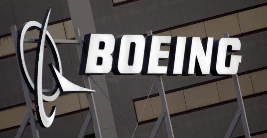 FILE - In this Jan. 25, 2011 file photo, the Boeing Company logo on the property in El Segundo, Calif. Boeing says aircraft deliveries are the strongest it has seen since March 2019. Boeing said Tuesday, July 12, 2022 that it delivered 51 passenger and cargo planes in June, as airlines continued to see a recovery in demand for travel.