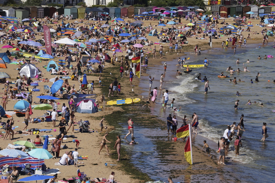 Crowds gather at the beach during a heat wave Saturday in Broadstairs,  England. Temperatures may reach 104 degrees Monday and Tuesday, which would be a record high.