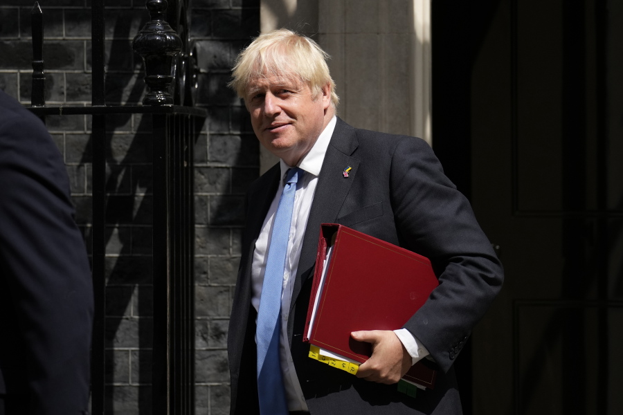 British Prime Minister Boris Johnson leaves 10 Downing Street, in London, to attend the weekly Prime Minister's Questions at the Houses of Parliament, Wednesday, July 20, 2022. The fractious race to replace Boris Johnson as Britain's prime minister entered an unpredictable endgame Tuesday as three candidates for Conservative Party leader were left battling for the two spots in a run-off vote.
