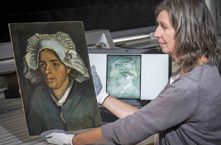 Senior Conservator Lesley Stevenson views Head of a Peasant Woman alongside an x ray image of the hidden Van Gogh self portrait. A previously unknown self-portrait of Vincent Van Gogh has been discovered behind another of the artist's paintings. The National Galleries of Scotland said Thursday it was discovered on the back of Van Gogh's "Head of a Peasant Woman" when experts took an X-Ray of the canvas ahead of an upcoming exhibition.