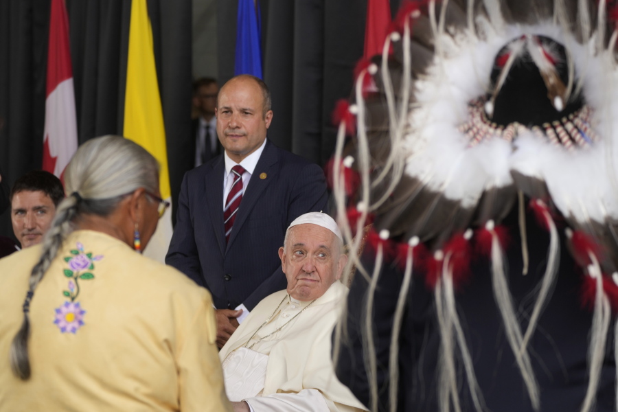 Pope Francis meets the Canadian Indigenous people as he arrives at Edmonton's International airport, Canada, Sunday, July 24, 2022. Pope Francis begins a weeklong trip to Canada on Sunday to apologize to Indigenous peoples for the abuses committed by Catholic missionaries in the country's notorious residential schools.