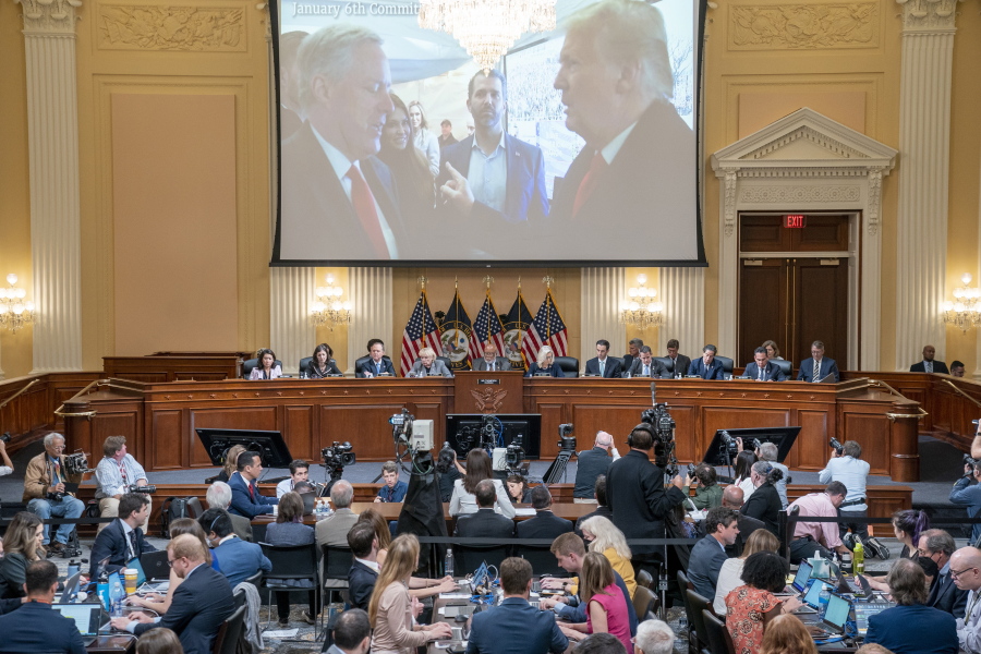 FILE - A image of former President Donald Trump talking to his chief of staff Mark Meadows is seen as Cassidy Hutchinson, former aide to Trump White House chief of staff Mark Meadows, testifies as the House select committee investigating the Jan. 6 attack on the U.S. Capitol holds a hearing at the Capitol in Washington, June 28, 2022.