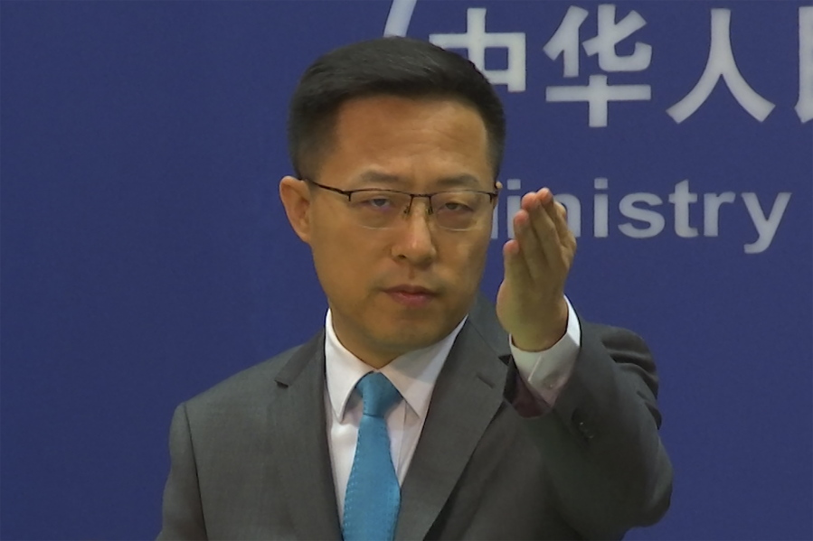 FILE - Chinese Foreign Ministry spokesperson Zhao Lijian gestures during a press conference at the Ministry of Foreign Affairs in Beijing on July 6, 2022. The United States is "the biggest threat to world peace, stability and development," China said Thursday,  July 7, continuing its sharp rhetoric in response to U.S.