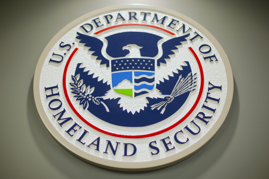 FILE - The Department of Homeland Security logo is seen during a news conference in Washington, Feb. 25, 2015. A new cybersecurity panel created by President Joe Biden says a computer vulnerability discovered last year in a ubiquitous piece of software is an "endemic" problem that will pose security risks for potentially a decade or more. The Cyber Safety Review Board said in a new report Thursday that while there hasn't been sign of any major cyberattack due to the Log4j flaw, it will still "be exploited for years to come." The Log4j flaw was first made public late last year.