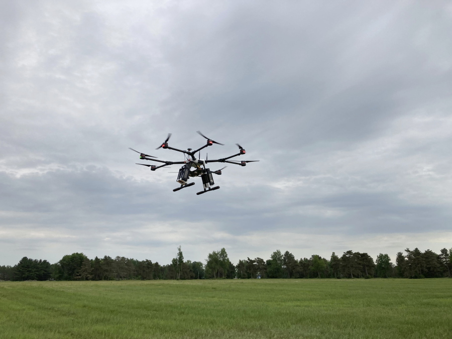 A drone flies at one of the Federal Aviation Administration's designated drone testing sites run by nonprofit Northeast UAS Airspace Integration Research Alliance Inc., at Griffiss International Airport in Rome, N.Y., on June 11, 2021. The FAA is working to relax some aviation rules to allow some drone operators to fly their machines out of their line of sight.