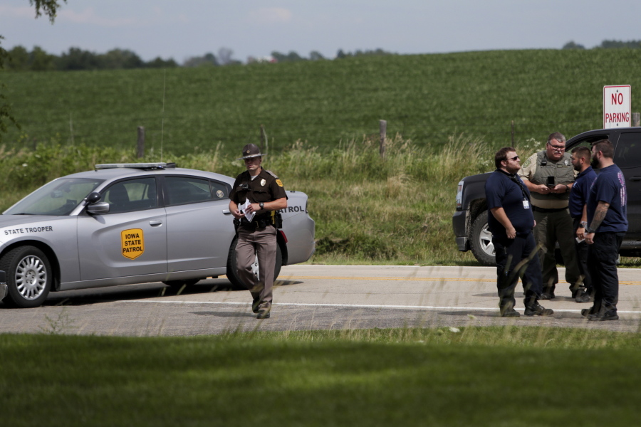 Emergency personnel block an entrance to the Maquoketa Caves State Park as investigate a shooting that left several people dead, Friday, July 22, 2022, in Maquoketa, Iowa. The campground was evacuated in the wake of the shooting.