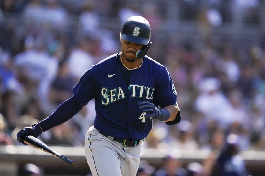 Seattle Mariners' Julio Rodriguez reacts after hitting a two-run home run during the fourth inning of a baseball game against the San Diego Padres, Monday, July 4, 2022, in San Diego.