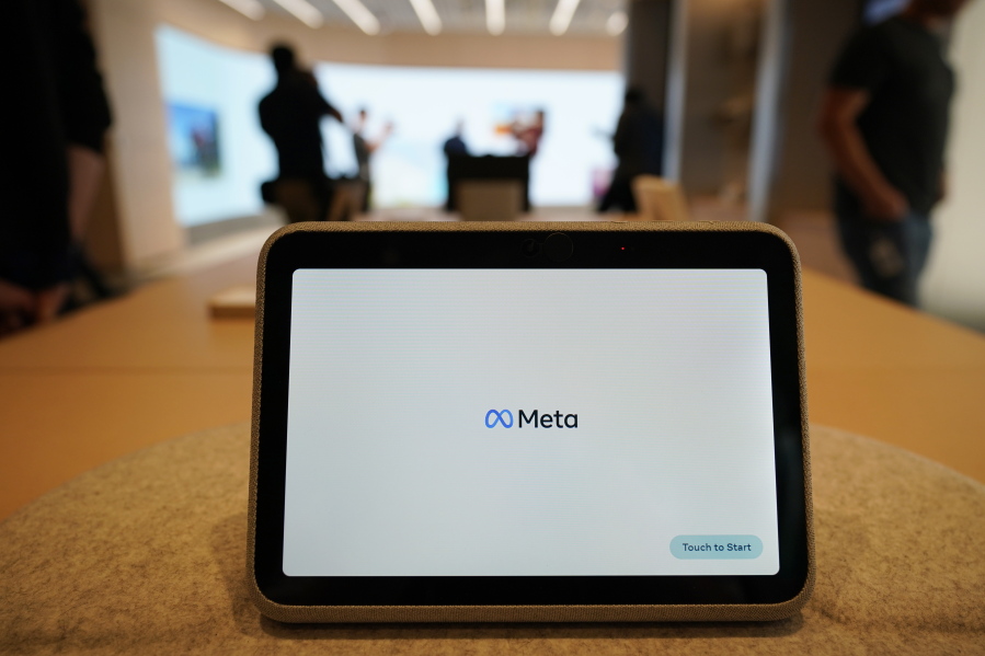 A Meta Portal Go is displayed during a preview of the Meta Store in Burlingame, Calif., Wednesday, May 4, 2022. Facebook and Instagram's parent company Meta posted its first revenue decline in history on Thursday, July 27, 2022 dragged by a drop in ad spending as the economy falters -- and as competition from rival TikTok intensifies.