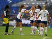 United States' Sophia Smith, second from right, is congratulated by a teammate after scoring her side's second goal against Jamaica during a CONCACAF Women's Championship soccer match in Monterrey, Mexico, Thursday, July 7, 2022.