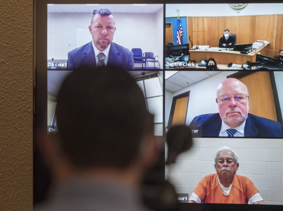 FILE - In this April 15, 2021, file photo defendants Paul Flores, top left, and his father, Ruben Flores, bottom right, appear via video conference during their arraignment in San Luis Obispo Superior Court in San Luis Obispo, Calif. The father and son were arrested in connection with the 1996 disappearance of Kristin Smart, a college student at California Polytechnic University San Luis Obispo. Paul Flores is charged with murder and his father, Ruben Flores, is charged as an accomplice for allegedly helping him bury her body. The two have pleaded not guilty. San Luis Obispo prosecutors say Paul Flores killed Smart while trying to rape her in his dorm room in May 1996 when they were freshmen students. The trial has been moved to Monterey County Superior Court in Salinas for Monday, July 18, 2022.