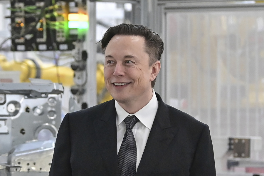 FILE - Tesla CEO Elon Musk attends the opening of the Tesla factory Berlin Brandenburg in Gruenheide, Germany, March 22, 2022. Twitter Inc.'s lawsuit to force billionaire Musk to make good on his promise to buy the social media giant will be resolved in a small but powerful Delaware court that specializes in high-stakes business disputes.