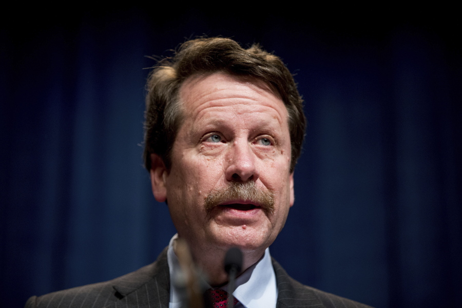 FILE - U.S. Food and Drug Administration Commissioner Dr. Robert Califf speaks at a news conference at the Hubert H. Humphrey Building in Washington, Thursday, May 5, 2016. Califf says a comprehensive review of the opioid painkillers that triggered the nation's ongoing drug overdose epidemic is in the works. But he faces skepticism about the long-promised review from lawmakers, experts and advocates after years of delay.