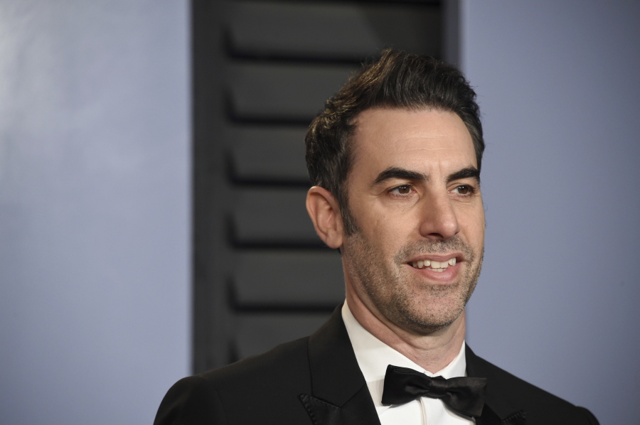 FILE - In this March 4, 2018, file photo, comedian Sacha Baron Cohen arrives at the Vanity Fair Oscar Party in Beverly Hills, Calif. On Thursday, July 7, 2022, Cohen defeated a $95 million defamation lawsuit by former Alabama Chief Justice Roy Moore, who said he was tricked into a humiliating television appearance that lampooned sexual misconduct accusations against him.